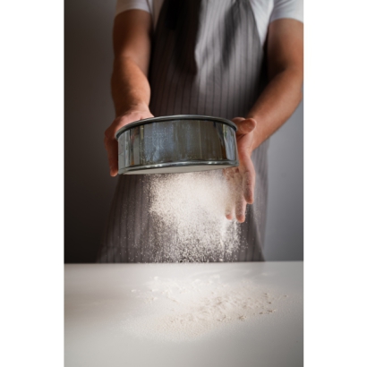 chef-sifting-through-flour.jpg